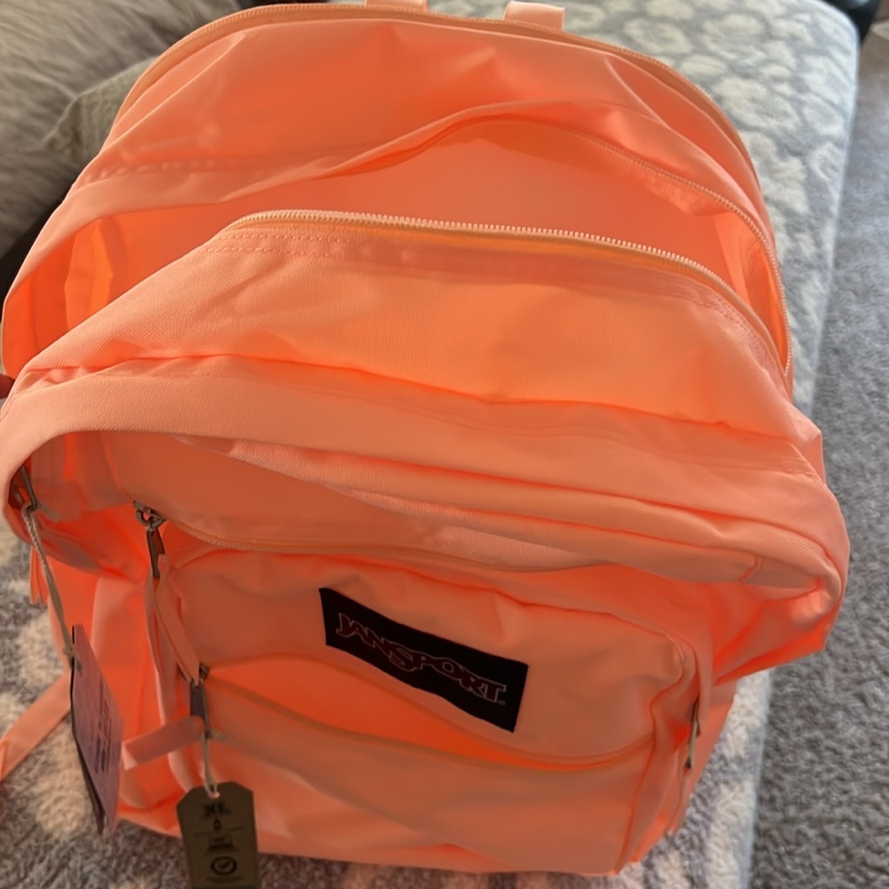 JanSport CrossTown Backpack in Peach Neon. - Picture 2 of 3